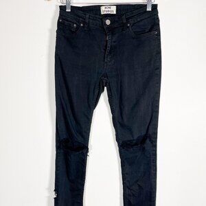 Acne Studios black broken in Flex jeans with holes in knees
